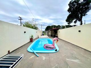 Casa com piscina , ar condicionado e churrasqueira no balneário Eliana - Guaratuba - 6