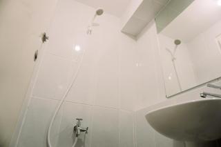 Cozy Studio at High Floor Tokyo Riverside PIK 2 Apartment By Travelio - Rawalembang - 1