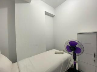 Bright and Relaxing 2BR Apartment at Mekarwangi Square Cibaduyut By Travelio - 6