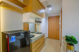 Best Deal and Tidy Studio at Evenciio Margonda Apartment By Travelio - Depok - 1