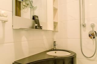Cozy and Minimalist Studio at Sky House BSD Apartment By Travelio - Tangerang - 2