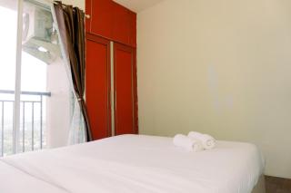 Nice and Homey 1BR at Serpong Greenview Apartment By Travelio - 9