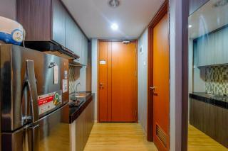 Cozy Living and Homey Studio Apartment at Margonda Residence 5 By Travelio - Depok - 1