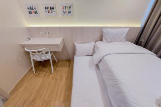 Nice and Spacious 2BR with Extra Room at Branz BSD City Apartment By Travelio - Tangerang - 7