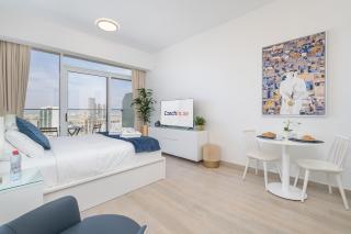 Marina & Downtown Views in Modern Studio - JVC - Dubai - 4