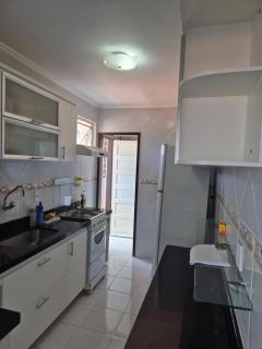Apartamento com três quartos pé na areia - 9