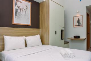 Comfy Studio Room at Evenciio Margonda Apartment By Travelio - Depok - 1