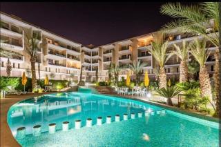 Bel appartement à Marrakech dans la résidence Pearl Garden avec piscine située sur la route de Casablanca Sa grande terrasse a une splendide vue sur la ville et les montagnes de l'Atlas A quelques minutes du centre ville et du grand Stade de Marrakech - 8