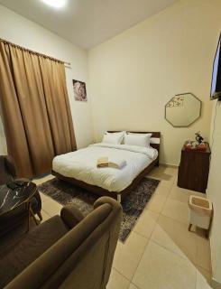 Room with bathroom near beach walk la mer beach Oima leasing property - 1