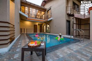 Areca Breeze by VEO - Part of StayVista with Pool - Nāgaonkhar - 9