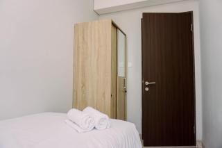 Comfort and Homey 2BR at Transpark Bintaro Apartment By Travelio - 4
