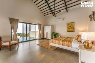 StayVista at Ekan with Sea views, Pool, WiFi - Alībāg - 3