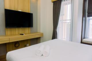 Minimalist and Warm Studio at Transpark Bintaro Apartment By Travelio - Tangerang - 6