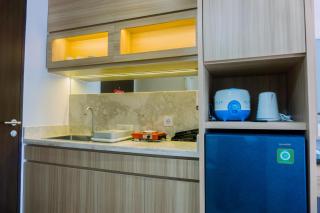 Minimalist and Warm Studio at Transpark Bintaro Apartment By Travelio - Tangerang - 1