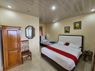 Penginapan Bunga Sonsang kamar Family Tripel - - 6