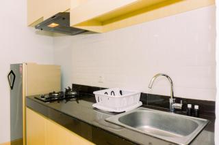 Comfortable and Modern Look 1BR at CitraLake Suites Apartment By Travelio - Jakarta - 2
