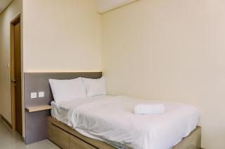 Homey and Cozy Living Studio Apartment at B Residence By Travelio - Tangerang - 7