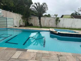Casa com piscina para 18 pessoas, wi-fi 3 quartos 4 banheiros estacionamento interno churrasqueira e forno de pizza 230m2 de área constuida aceita pets - Bertioga - 3