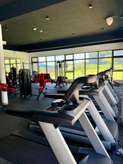 Serenity Sunset View Apartment Hotel - Verdant Garden - 4