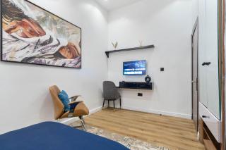 3 bedroom duplex features a gym,lougne,jacuzzi,ps5,concierge - 7