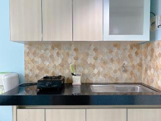 Minimalist Studio Grand Sentraland Karawang Apartment By Travelio - 1