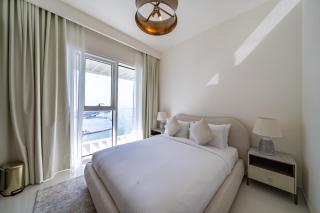 Homes Beyond l Elegant 2BR with Wide Sea Views - 2