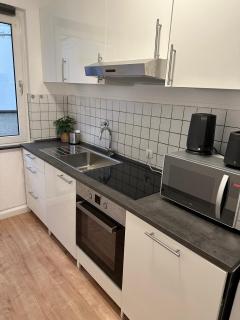 City Apartment with 2 individual beds and sleeping sofa and kitchen - - 9