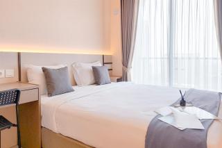 Cozy Living Studio at Sky House BSD Apartment By Travelio - 0