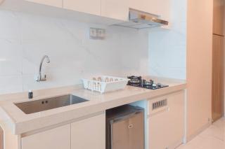 Cozy Living Studio at Sky House BSD Apartment By Travelio - 5
