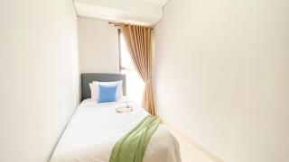 Homey and Good Place 2BR Transpark Bintaro Apartment By Travelio - 4
