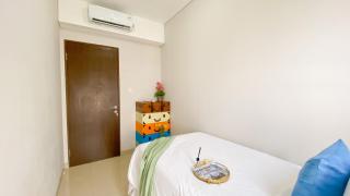 Homey and Good Place 2BR Transpark Bintaro Apartment By Travelio - 2