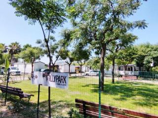 Happy Camp mobile homes in Duca Amedeo Camping Village - 1