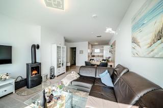 Fewo-Kleine-Auszeit-by-Seeblick-Ferien-ORO-direkter-Wasserblick-am-Strand - 8