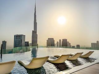 Stunning 2BR with Burj View & Infinity Pool - Dubai - 7