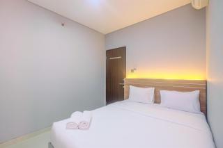 Fully Furnished with Cozy Design 2BR Apartment Transpark Cibubur By Travelio - 9