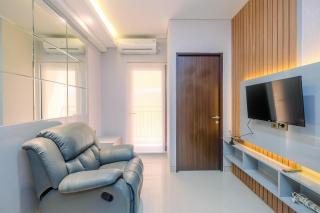 Fully Furnished with Cozy Design 2BR Apartment Transpark Cibubur By Travelio - 1