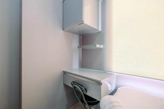 Fully Furnished with Cozy Design 2BR Apartment Transpark Cibubur By Travelio - 4