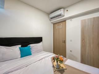 Simple 2BR at Meikarta Apartment By Travelio - 7