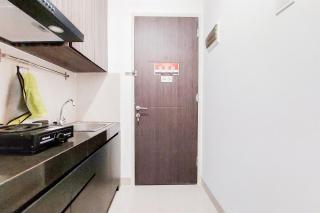 Restful and Warm Studio Serpong Garden Apartment By Travelio - 6