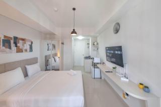 Comfortable and Homey Studio Room at Barsa City Apartment By Travelio - 8