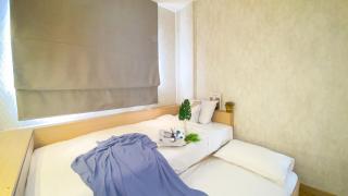 Modern Look 2BR at Puri Garden Apartment By Travelio - 3