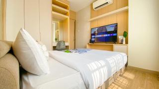 Modern Look 2BR at Puri Garden Apartment By Travelio - 8