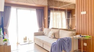 Modern Look 2BR at Puri Garden Apartment By Travelio - 1