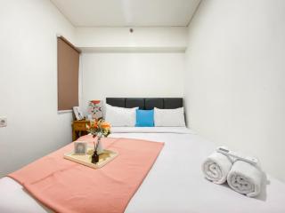 Warm and Homey 2BR at Meikarta Apartment By Travelio - 9