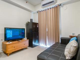 Warm and Homey 2BR at Meikarta Apartment By Travelio - 1
