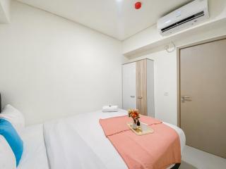 Warm and Homey 2BR at Meikarta Apartment By Travelio - 4