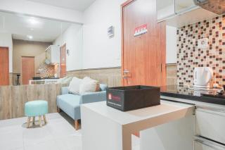 Minimalist and Comfy 2BR at Titanium Square Apartment By Travelio - 1