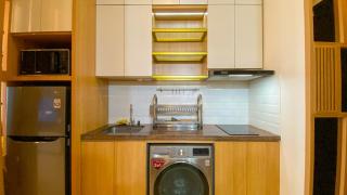Nice and Homey 1BR at Sudirman Suites Apartment By Travelio - 1