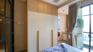 Nice and Homey 1BR at Sudirman Suites Apartment By Travelio - 9