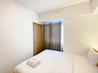 Spacious and Homey 2BR with Work Space at Meikarta Apartment By Travelio - 8